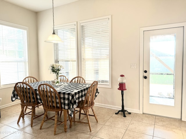 tiled dining area with plenty of natural light