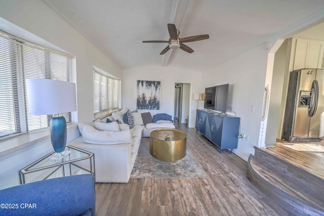 living room featuring ceiling fan, hardwood / wood-style floors, and lofted ceiling