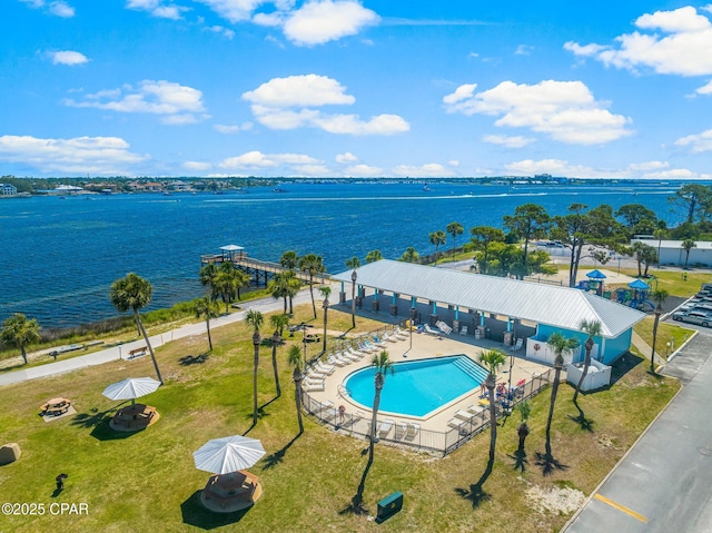 birds eye view of property featuring a water view