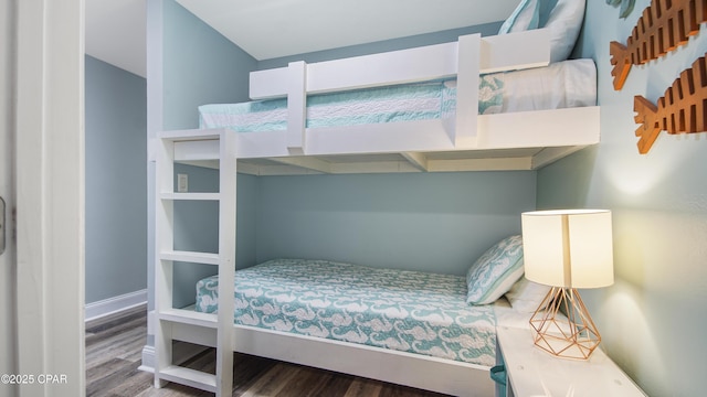 bedroom with wood-type flooring