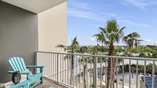 balcony featuring a water view