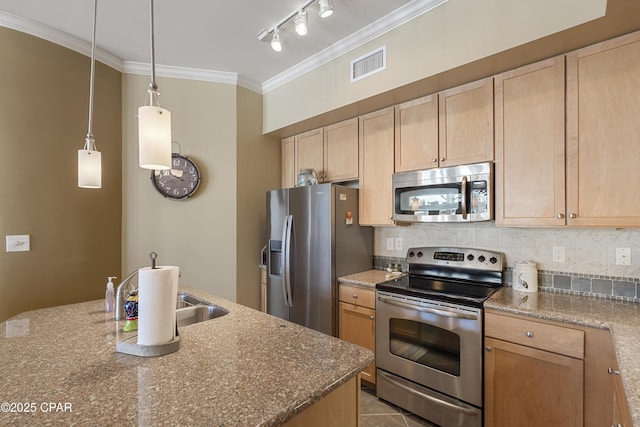 kitchen featuring light brown cabinets, stainless steel appliances, and tasteful backsplash