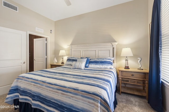 bedroom featuring ceiling fan, carpet floors, and vaulted ceiling