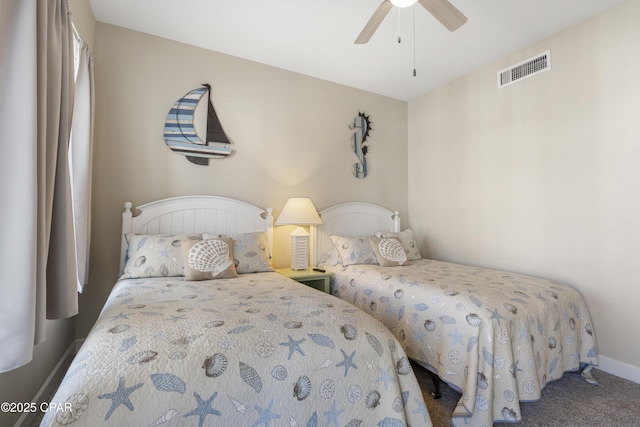 bedroom featuring ceiling fan and carpet floors