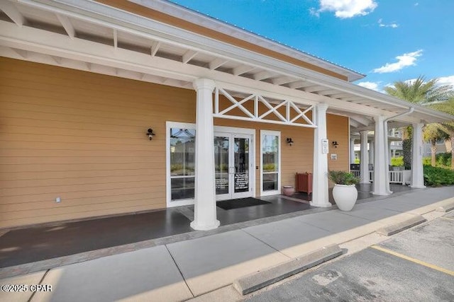 property entrance featuring french doors