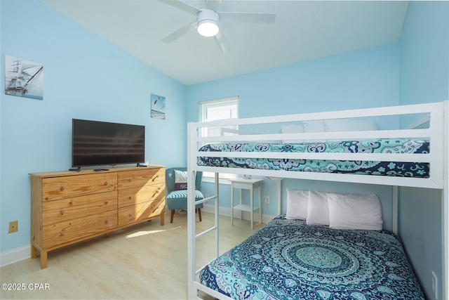 bedroom featuring ceiling fan and wood-type flooring