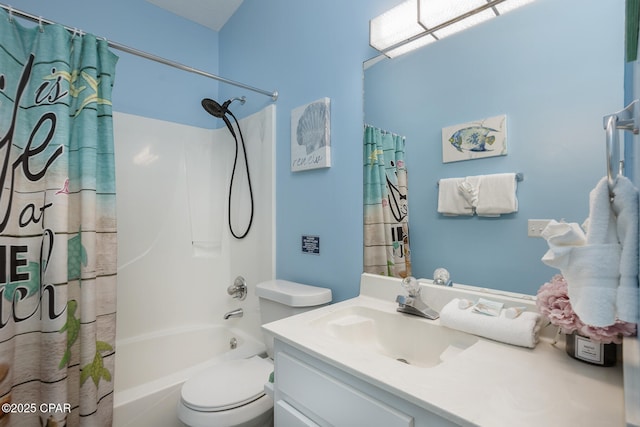 full bathroom with toilet, vanity, and shower / bath combo with shower curtain