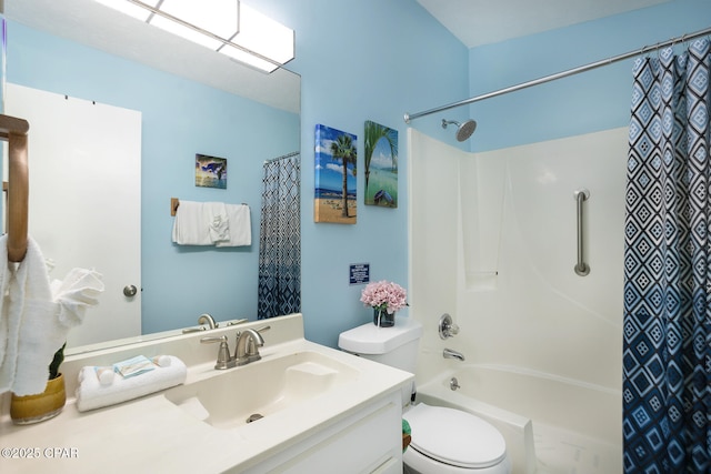 full bathroom featuring toilet, vanity, and shower / bath combo with shower curtain