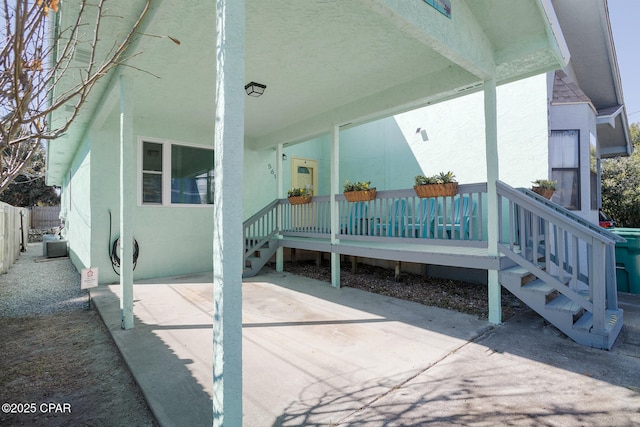 exterior space featuring a patio area and cooling unit