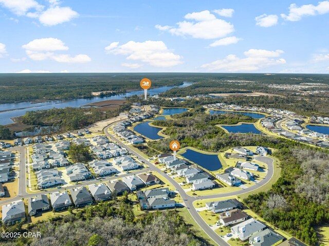 aerial view with a residential view and a water view