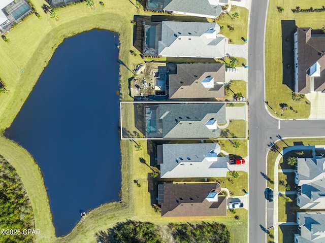 birds eye view of property featuring a water view