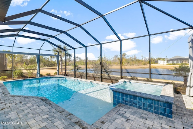 view of swimming pool with a lanai, a water view, a patio area, pool water feature, and an in ground hot tub