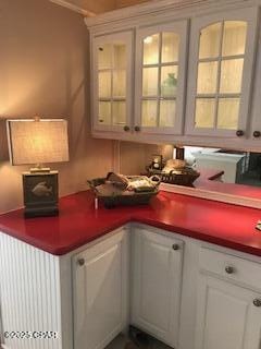 kitchen featuring white cabinetry