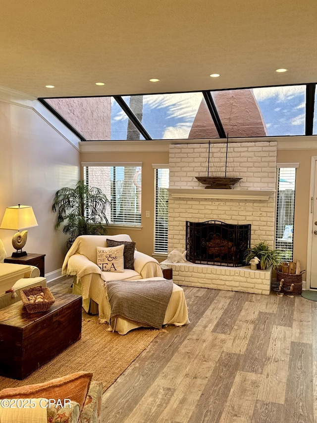 sunroom featuring a fireplace