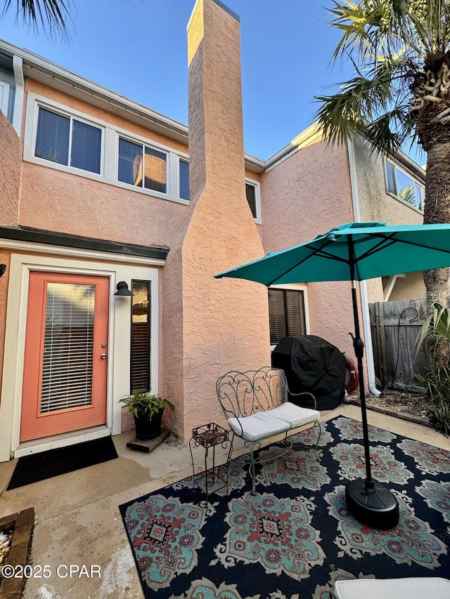 rear view of house with a patio area