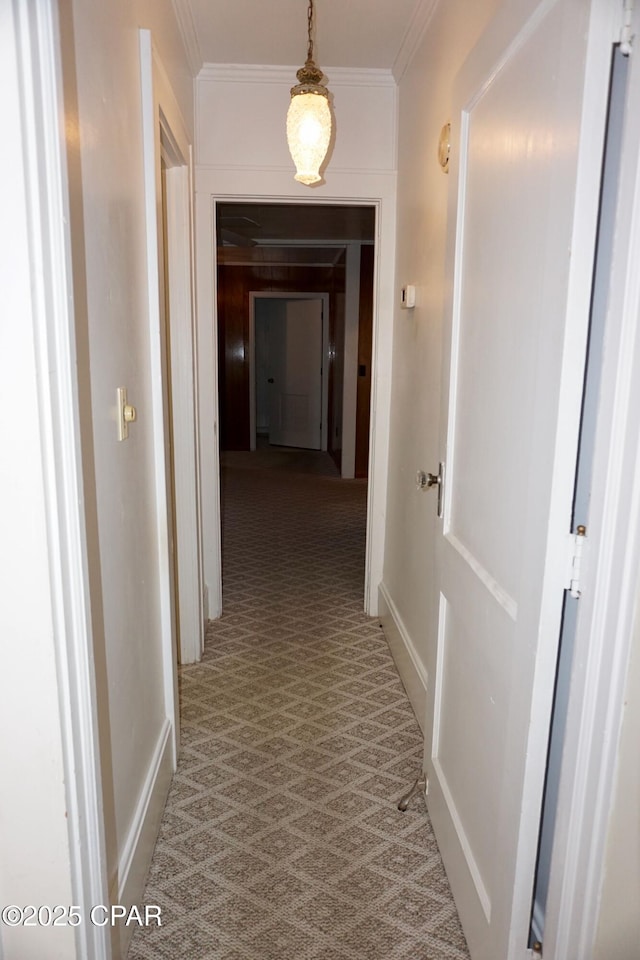 corridor featuring ornamental molding