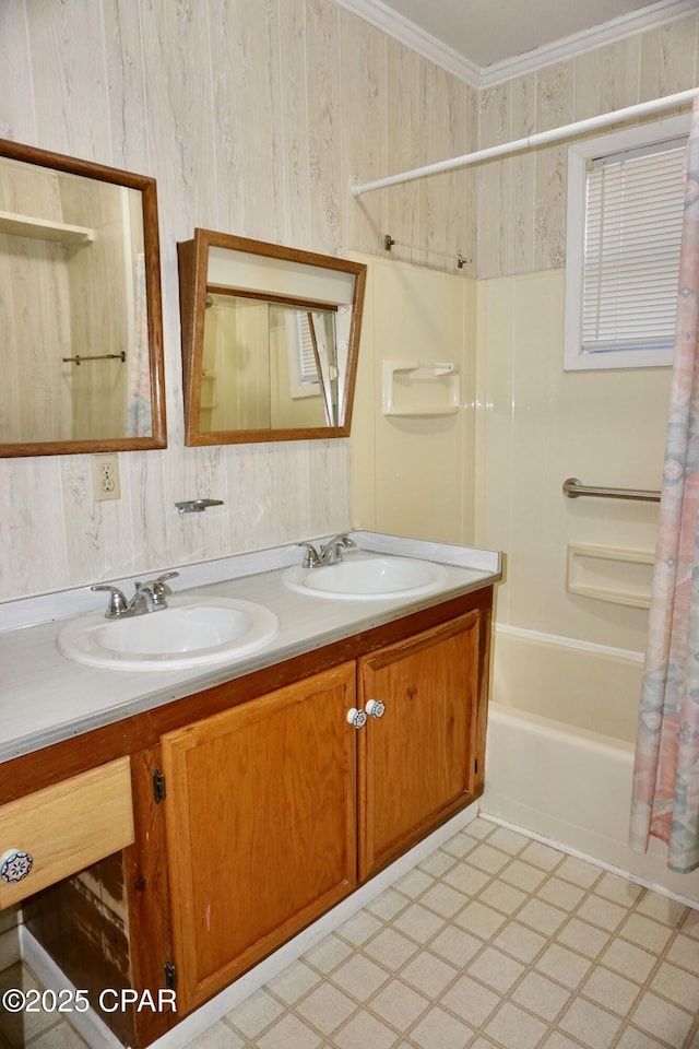 bathroom featuring shower / bath combo, ornamental molding, vanity, and wood walls