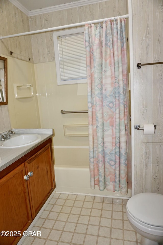 full bathroom with vanity, shower / tub combo, wooden walls, and toilet