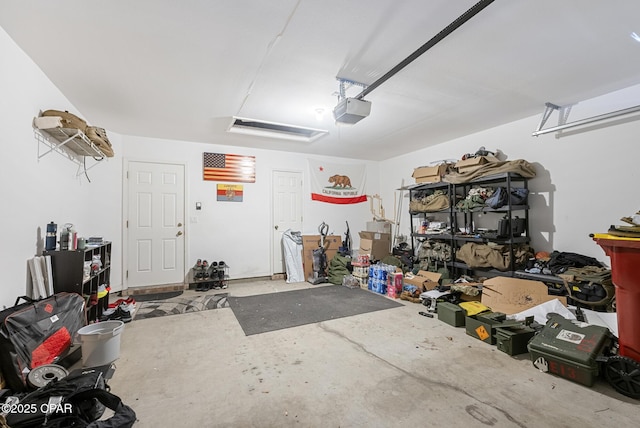 garage featuring a garage door opener