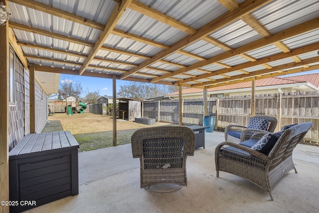 view of patio featuring outdoor lounge area and a playground