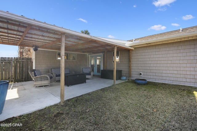 view of patio / terrace featuring an outdoor living space and french doors