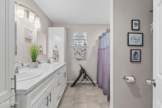 bathroom with vanity and tile patterned floors