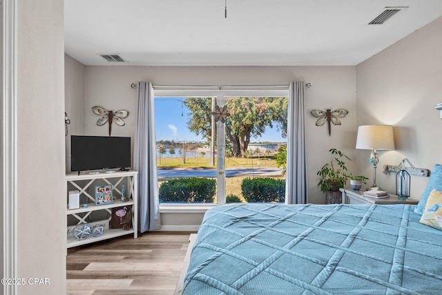 bedroom featuring hardwood / wood-style flooring