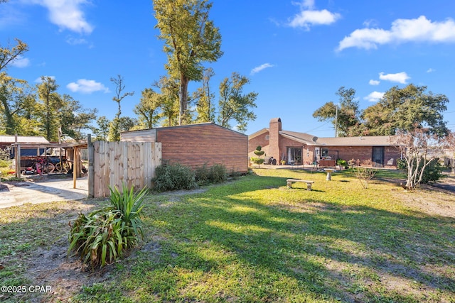 view of yard featuring a carport