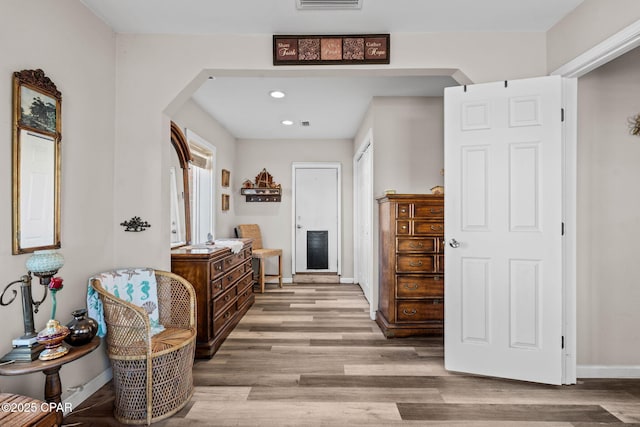 hall featuring light hardwood / wood-style floors