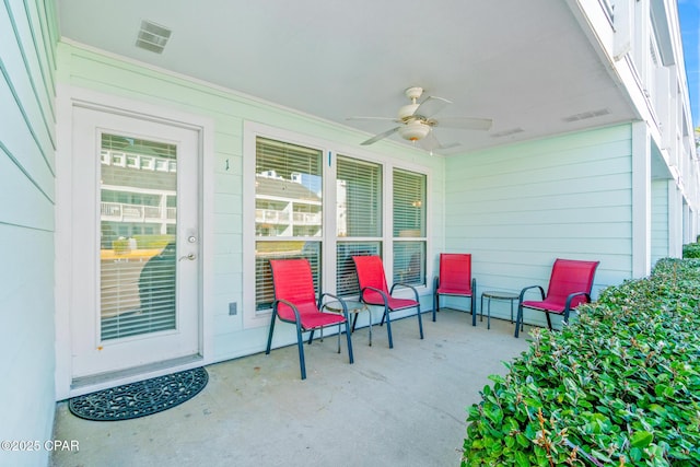 view of patio with ceiling fan