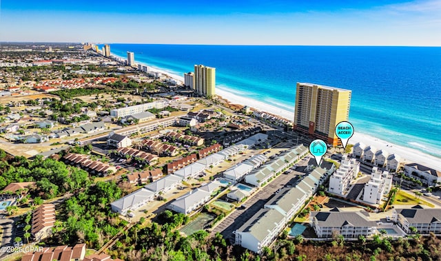 bird's eye view featuring a water view and a view of the beach