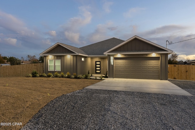 view of front of property with a garage