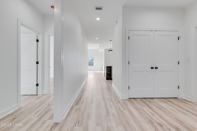 hallway featuring light hardwood / wood-style flooring