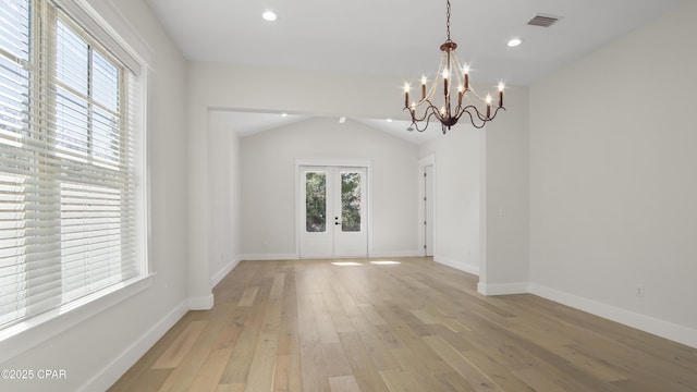 3511 Cottage Cove Ln, Panama City, FL 32408 - unfurnished dining area featuring a chandelier, light wood-type flooring, baseboards, french doors, and recessed lighting