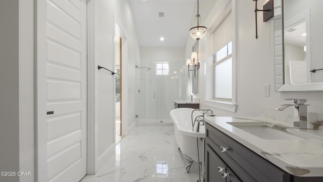 3511 Cottage Cove Ln, Panama City, FL 32408 - full bathroom with a stall shower, a soaking tub, marble tiled floors, vanity, and a chandelier