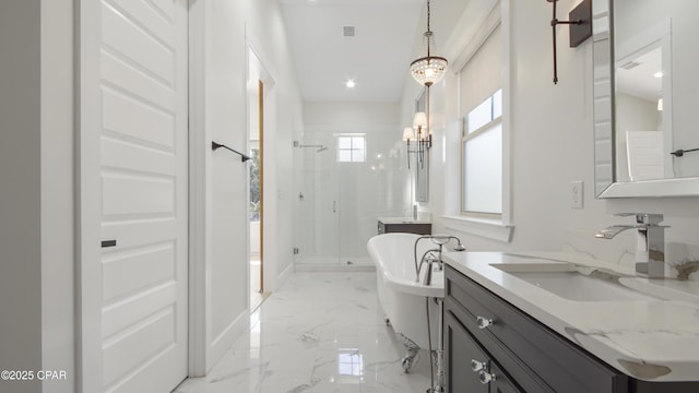 bathroom with vanity, independent shower and bath, and an inviting chandelier