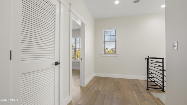 3511 Cottage Cove Ln, Panama City, FL 32408 - corridor featuring hardwood / wood-style flooring, recessed lighting, an upstairs landing, and baseboards