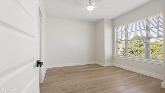 3511 Cottage Cove Ln, Panama City, FL 32408 - unfurnished room featuring light wood-style flooring, baseboards, and ceiling fan