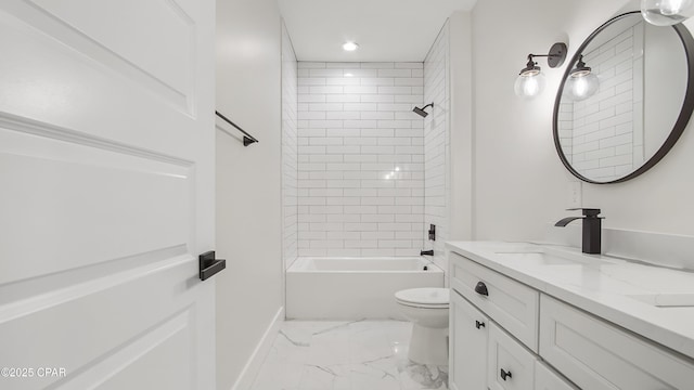 full bathroom featuring toilet, vanity, and tiled shower / bath