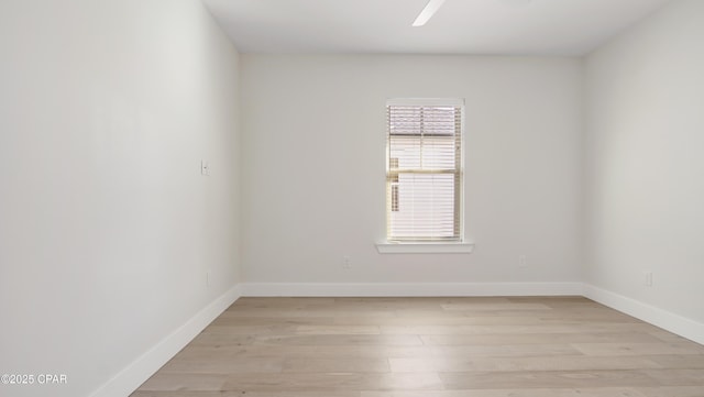 3511 Cottage Cove Ln, Panama City, FL 32408 - unfurnished room with light wood-style floors and baseboards