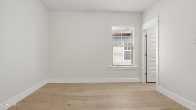 empty room with light wood-type flooring