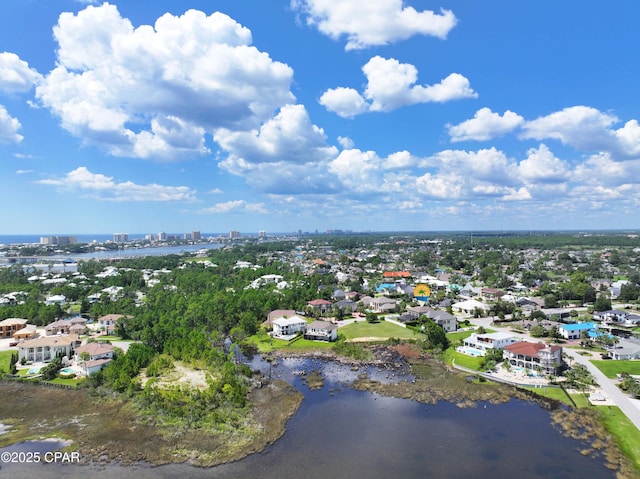 bird's eye view featuring a residential view and a water view