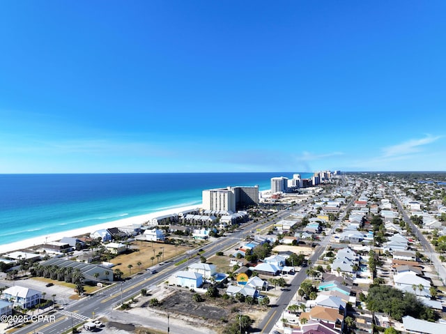 aerial view featuring a water view and a beach view