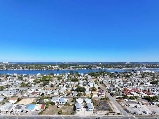 bird's eye view with a water view and a residential view