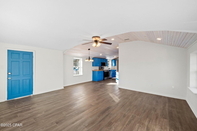 unfurnished living room featuring dark wood-type flooring, ceiling fan with notable chandelier, and wooden ceiling