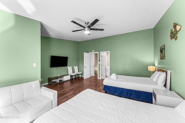 bedroom with ceiling fan, a textured ceiling, and hardwood / wood-style flooring