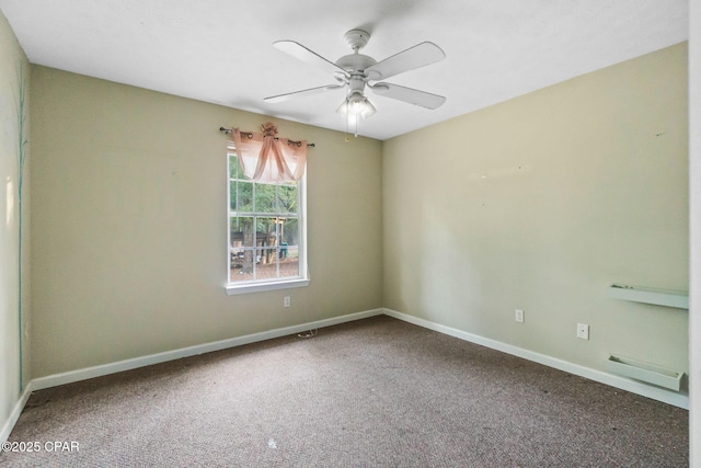 unfurnished room featuring ceiling fan and carpet