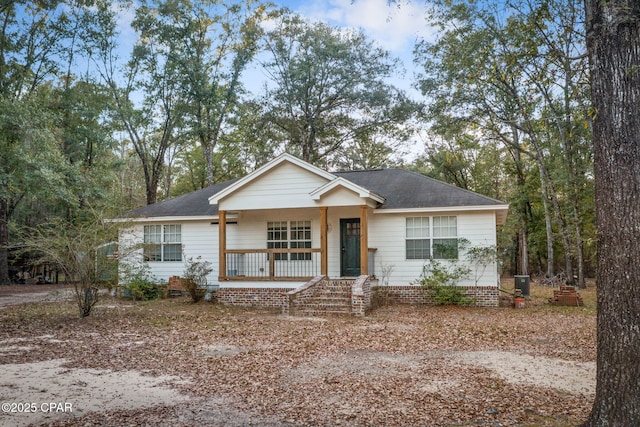 ranch-style house featuring a porch