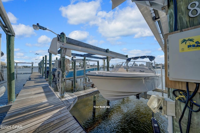 view of dock featuring a water view