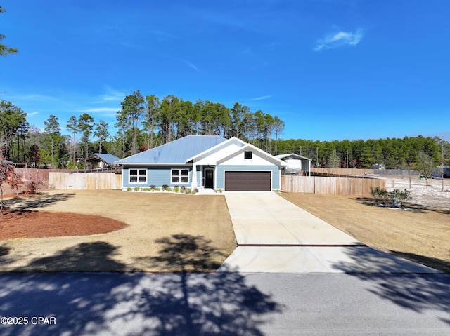 ranch-style house featuring a garage